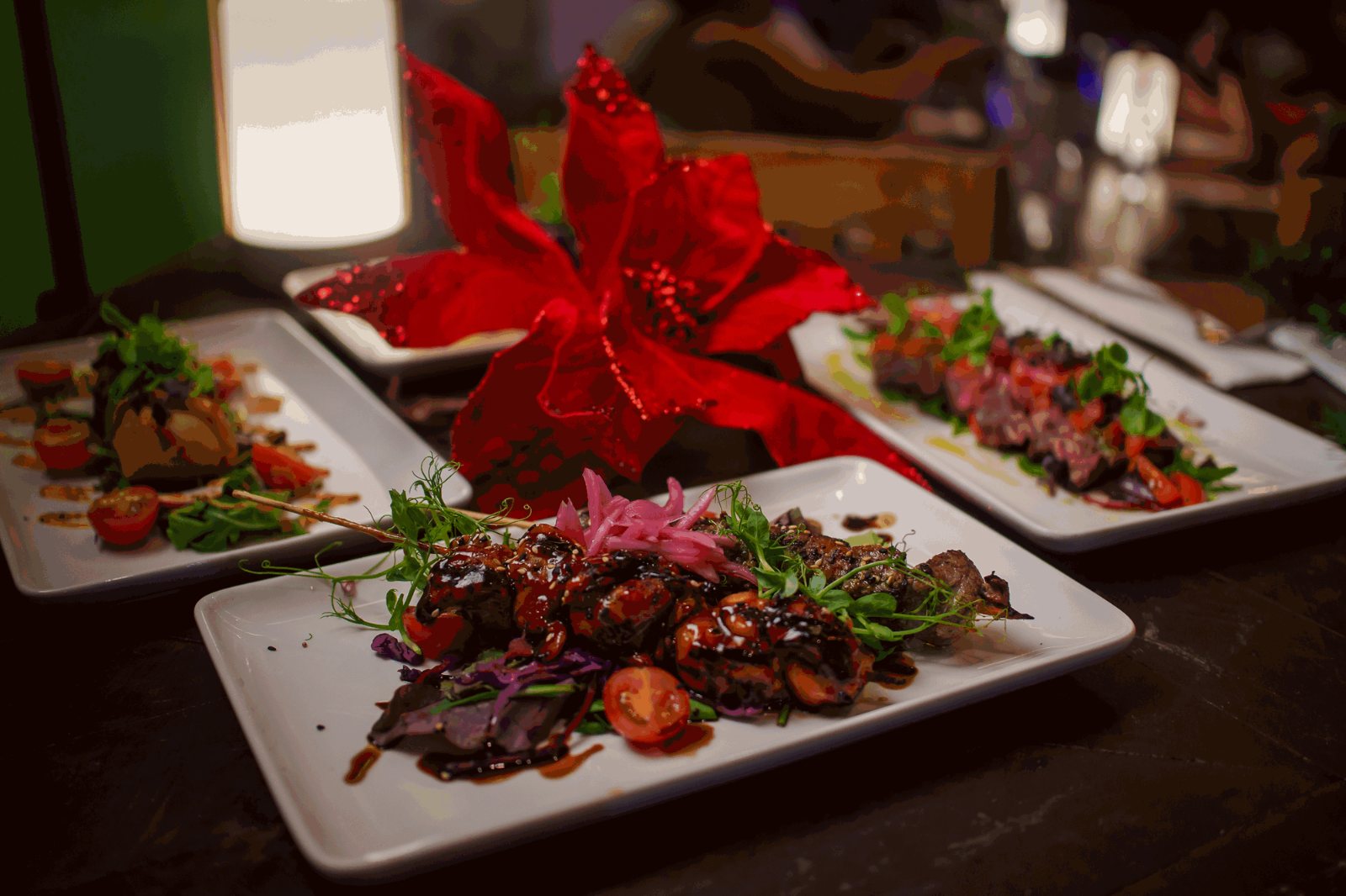 Christmas dinner table with poinsettia at Bodega Siete Gotas